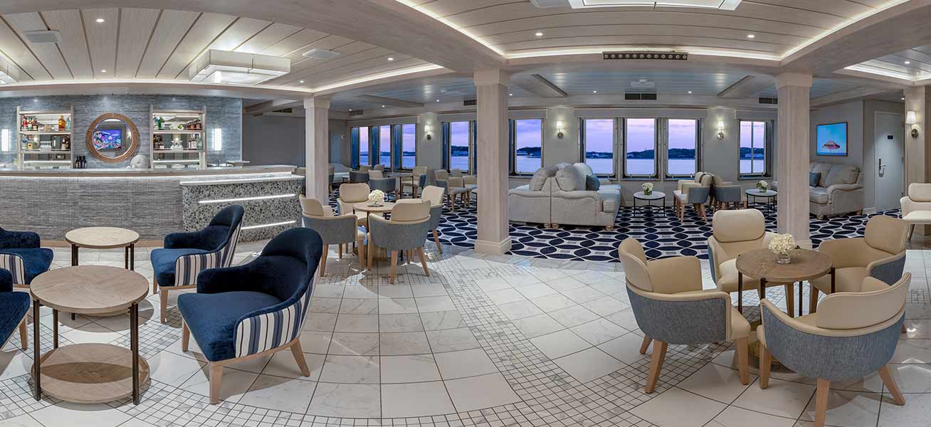 Luxury Cruise Ship Modern Lounge Deck An elegant and spacious lounge area aboard a modern cruise ship featuring contemporary furnishings