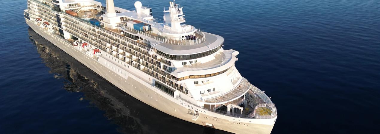 Luxury Cruise Ship at Sea Silversea luxury cruise ship sailing on calm blue waters