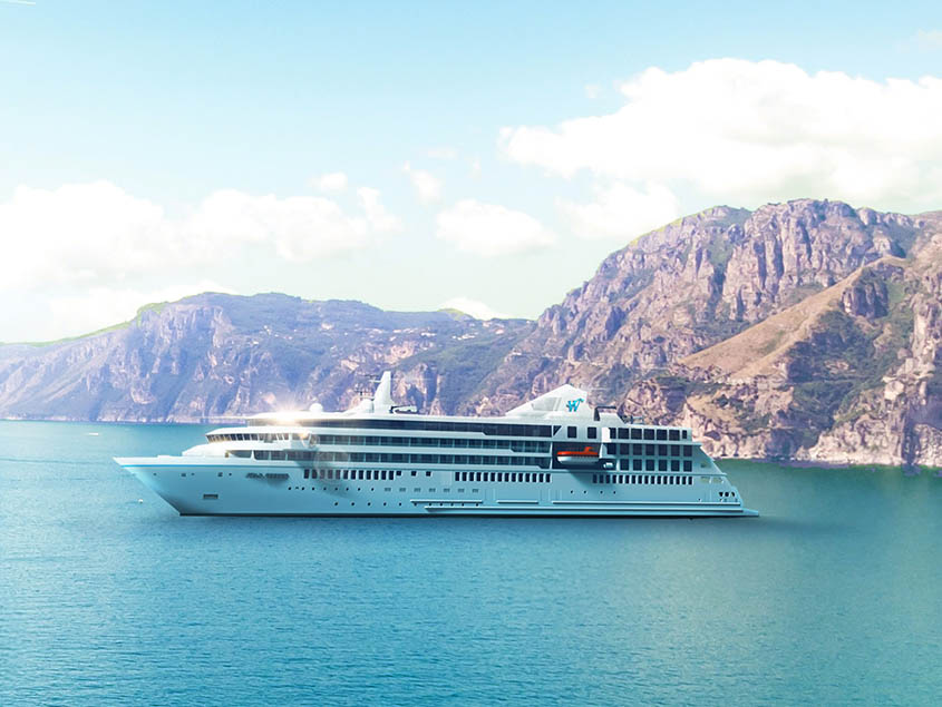 Luxury Cruise Ship in Rocky Coastal Landscape Windstar Star Plus Class cruise ship sailing through turquoise waters with dramatic rocky mountains