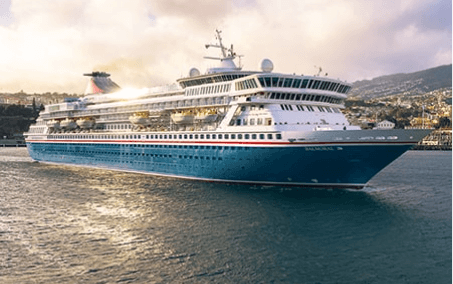 Modern Cruise Ship in Mediterranean Port A large contemporary cruise ship with distinctive blue hull and white superstructure is anchored