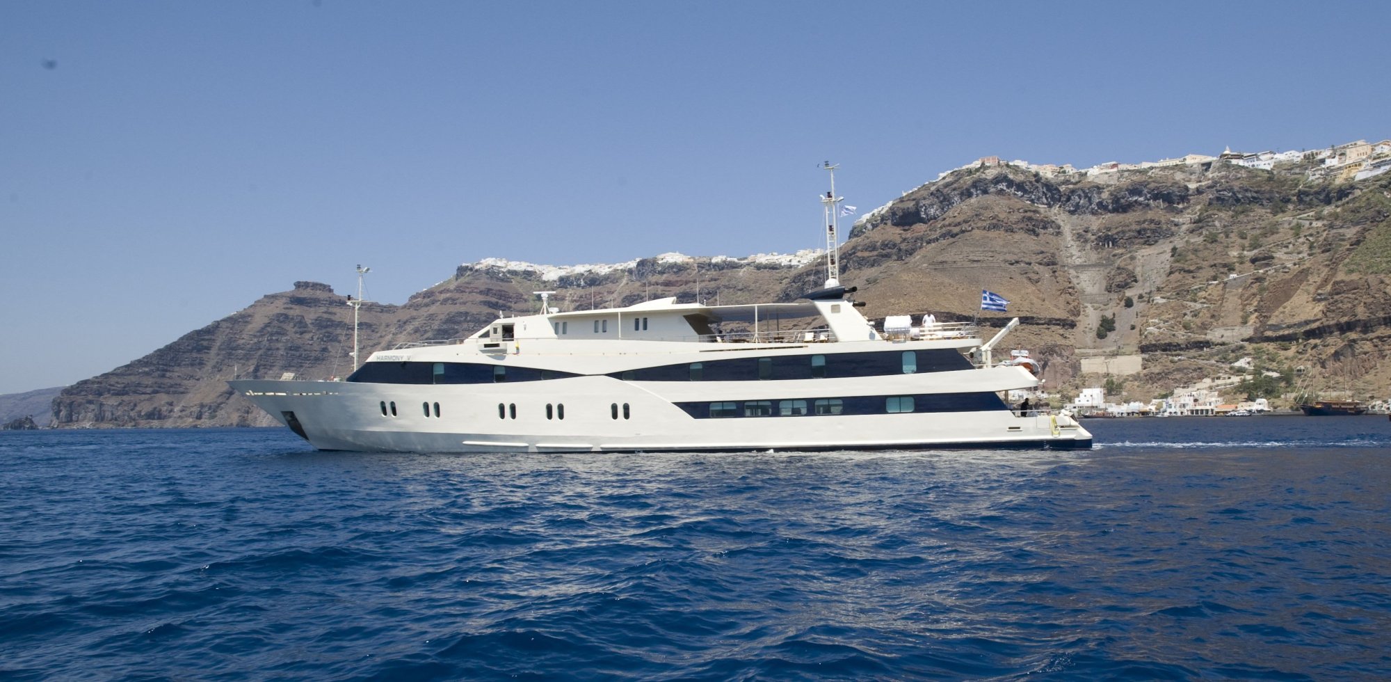 harmony-v-in-santorinui-2bd2a39763 Variety Cruises mega-yacht anchored off Santorini