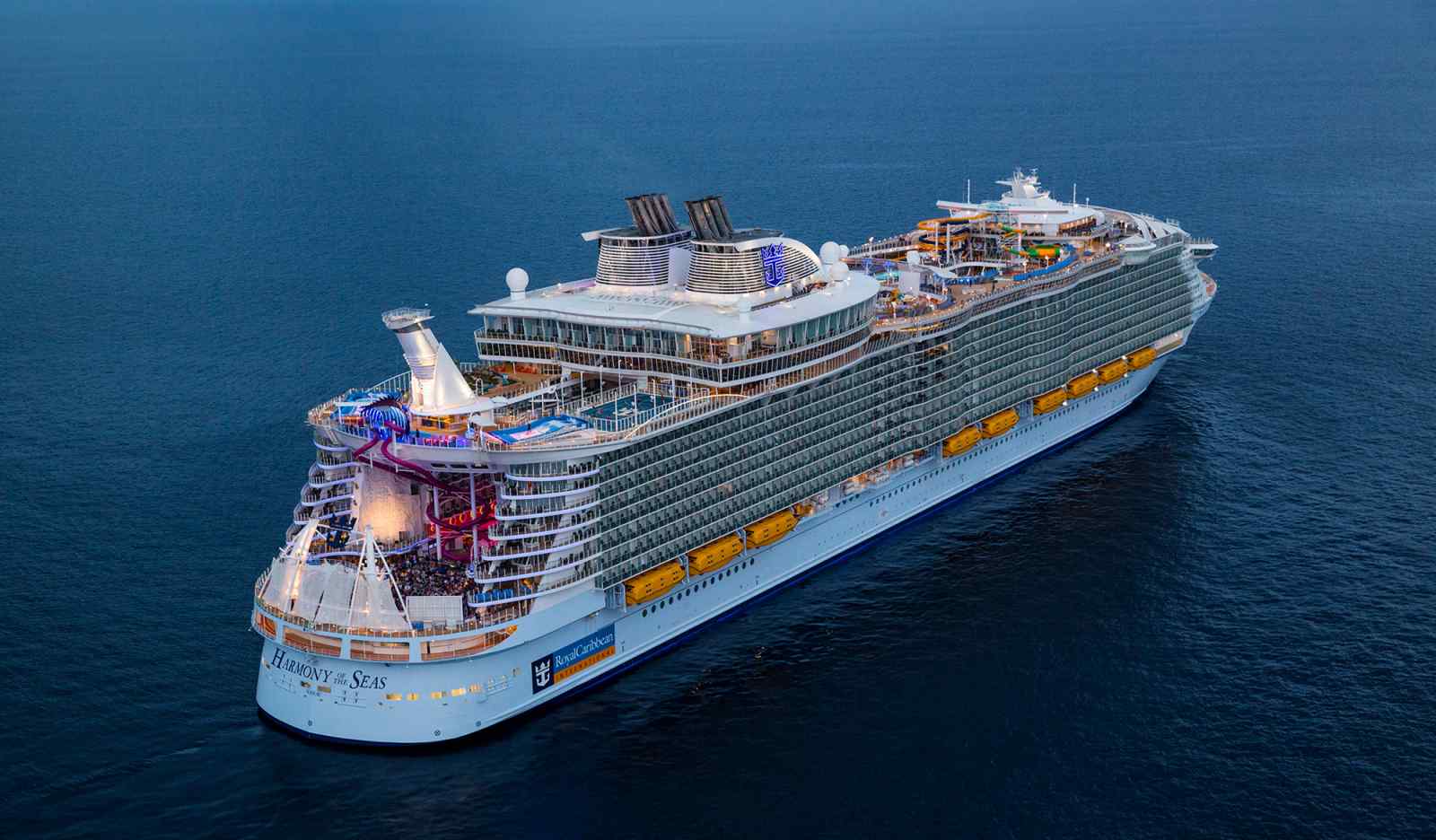 Harmony of the Seas Aerial View An aerial photograph of Royal Caribbean's Harmony of the Seas cruise ship positioned in calm blue