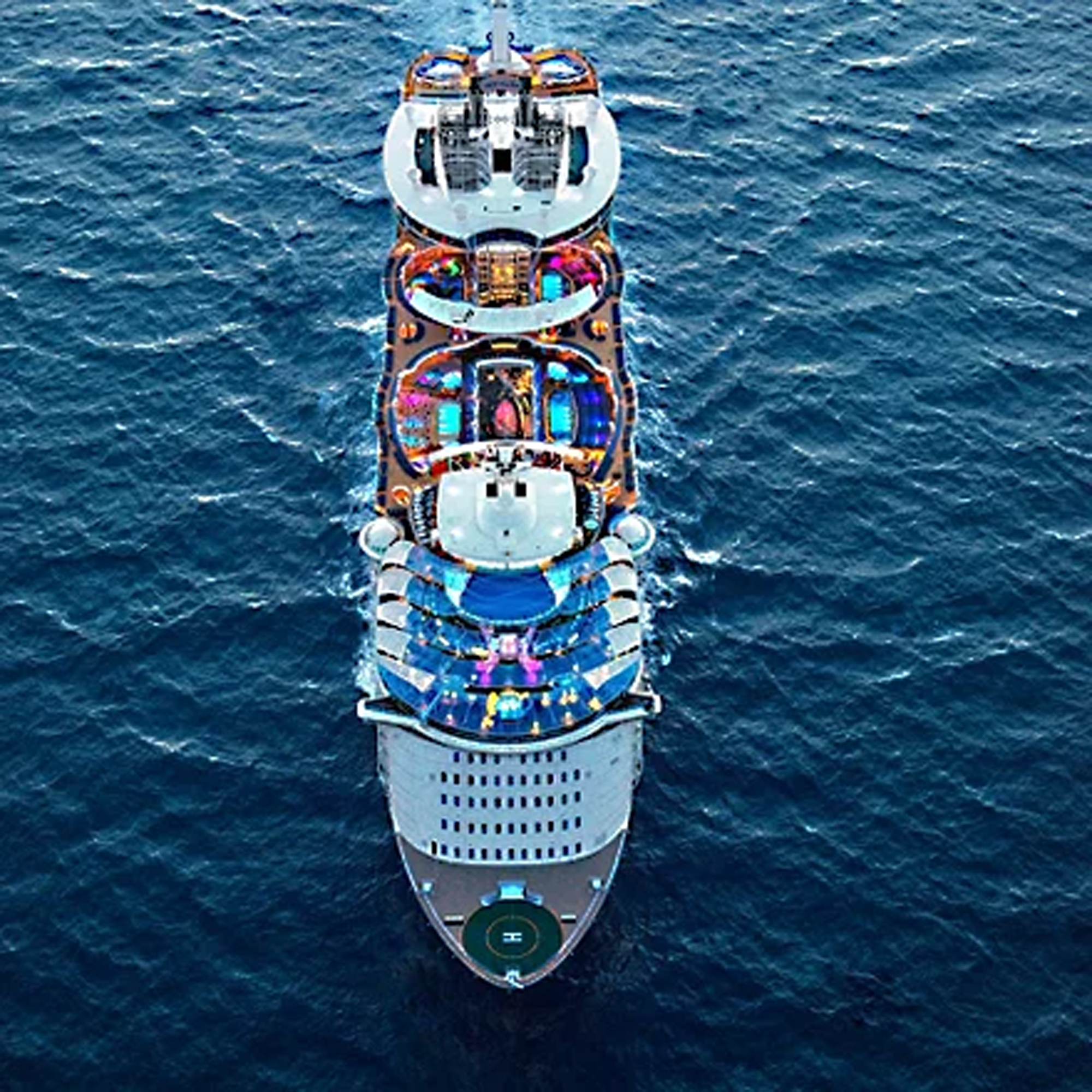 Modern Cruise Ship Aerial Deck View An overhead aerial photograph of a large modern cruise ship showcasing multiple colorful deck areas