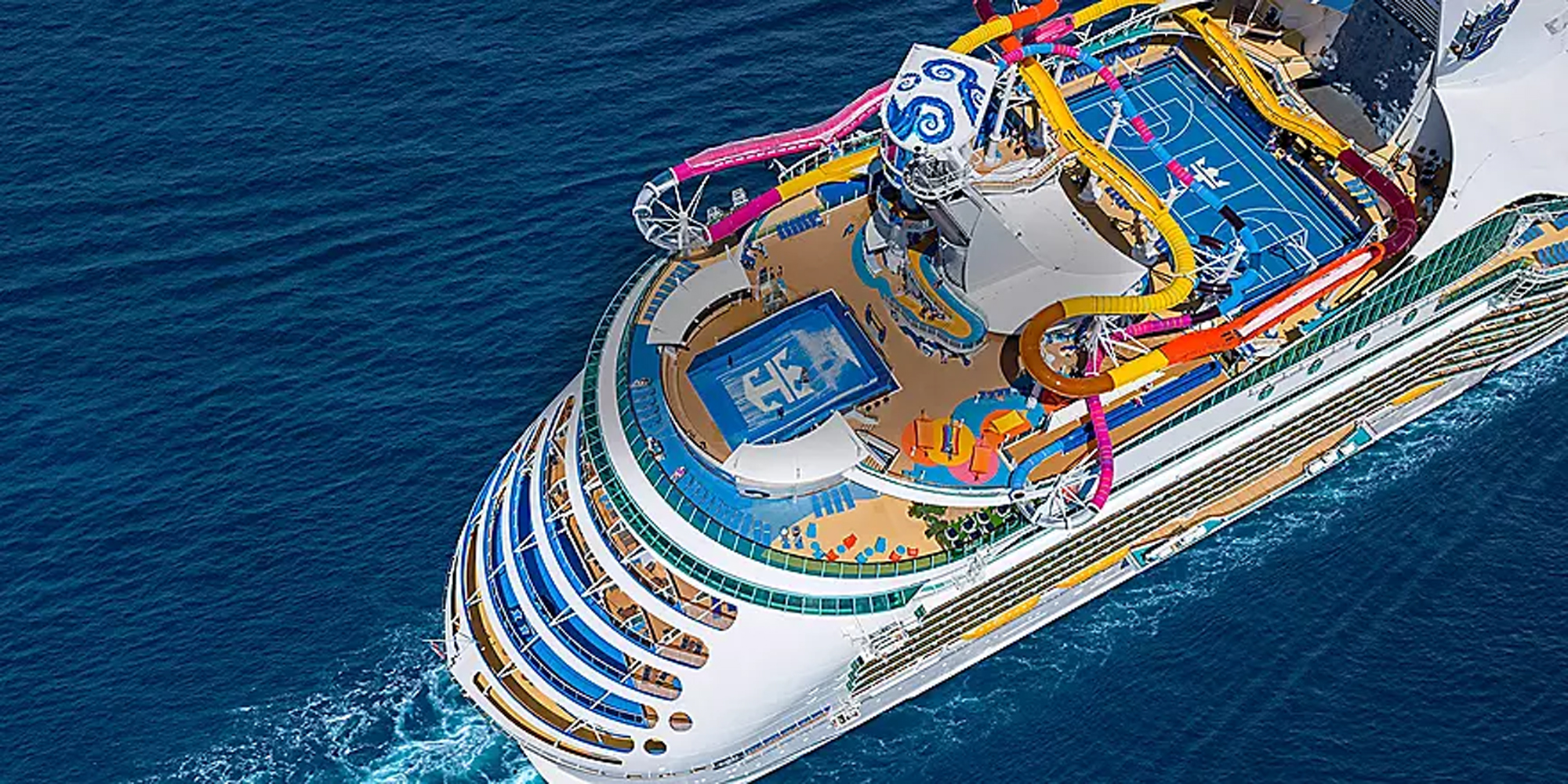 Navigator of the Seas Aerial Aft Deck View An aerial overhead view of a large cruise ship's aft (rear) section showing multiple colorful water