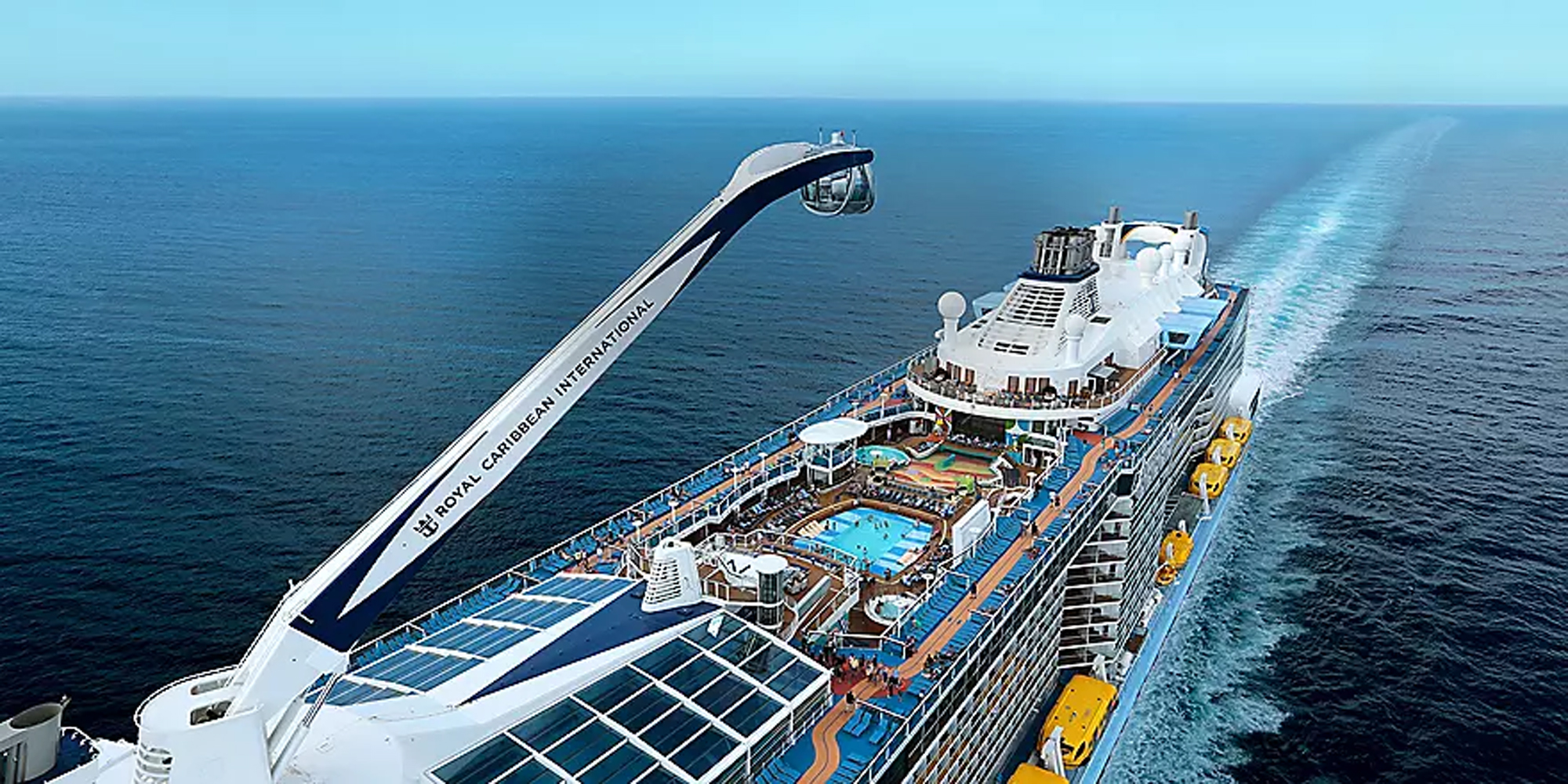 Royal Caribbean Cruise Ship Aerial View An aerial photograph of a large modern cruise ship at sea, showcasing its distinctive features