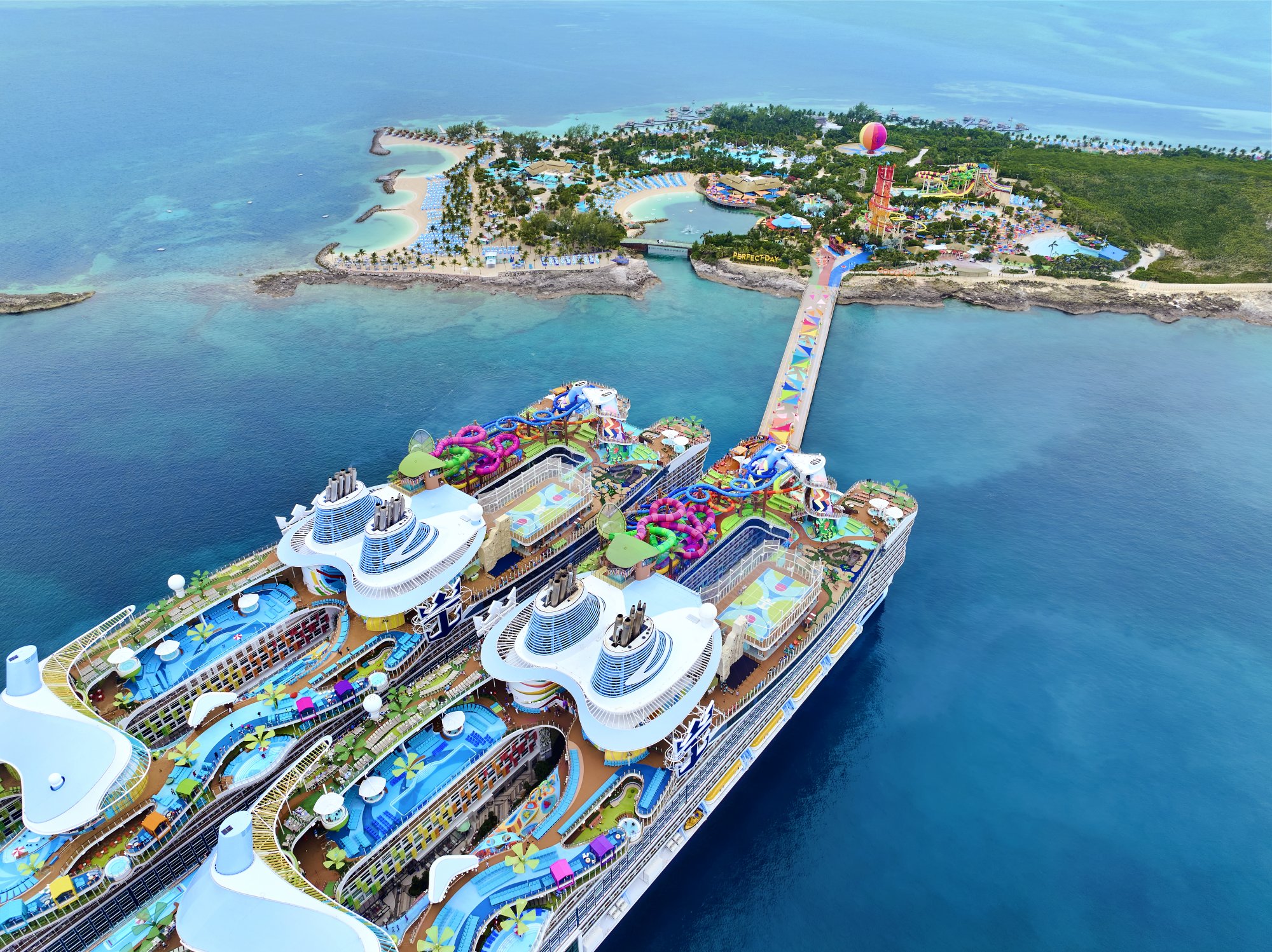 Royal Caribbean Ships Docked at Perfect Day Island Aerial view of multiple Royal Caribbean cruise ships docked at Perfect Day at CocoCay private island in the Bahamas