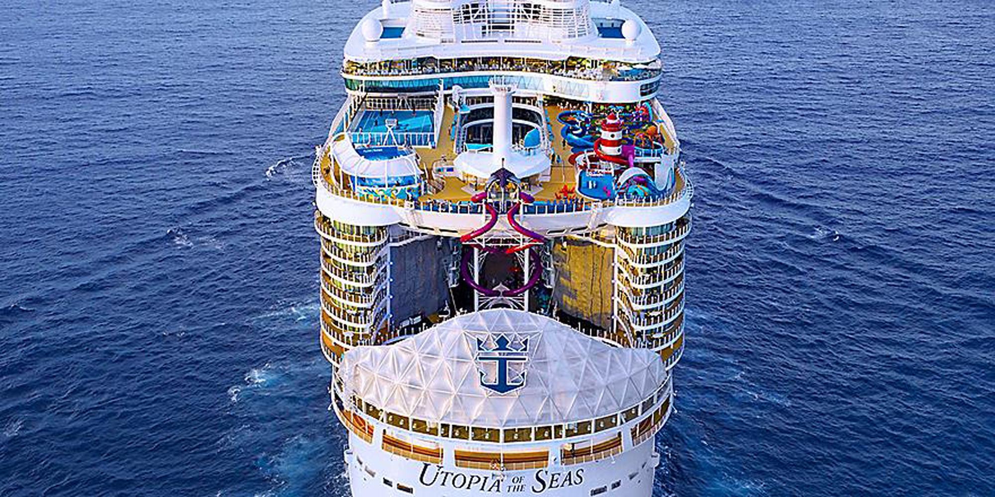 Utopia of the Seas Aerial View An aerial bow-on view of the Utopia of the Seas cruise ship at sea, displaying its distinctive