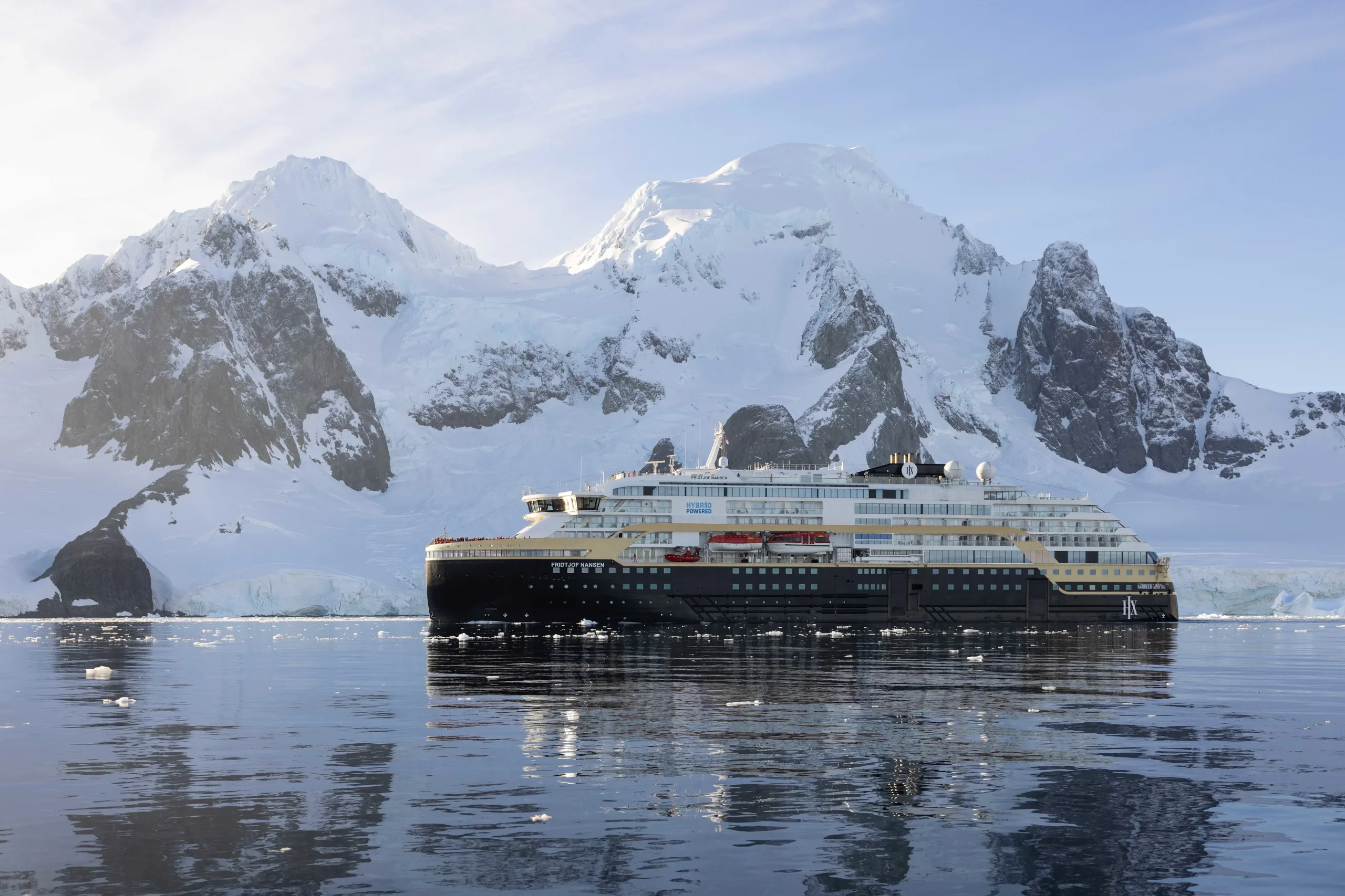 MS Fridtjof Nansen in Lemaire Channel, Antarctica The expedition cruise ship MS Fridtjof Nansen navigates through the stunning Lemaire Channel
