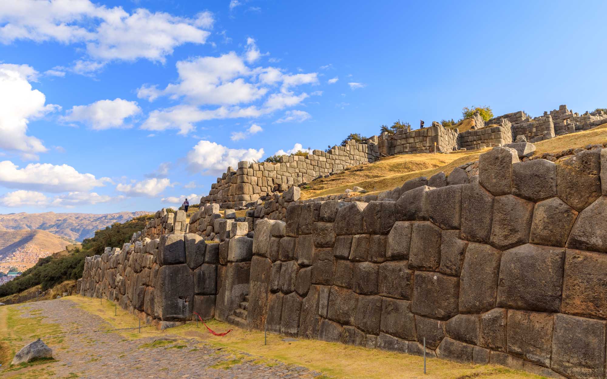 Ancient Inca Stone Walls at Sacsayhuamán Massive precisely-fitted stone blocks of the ancient Inca fortress Sacsayhuamán near Cusco, Peru