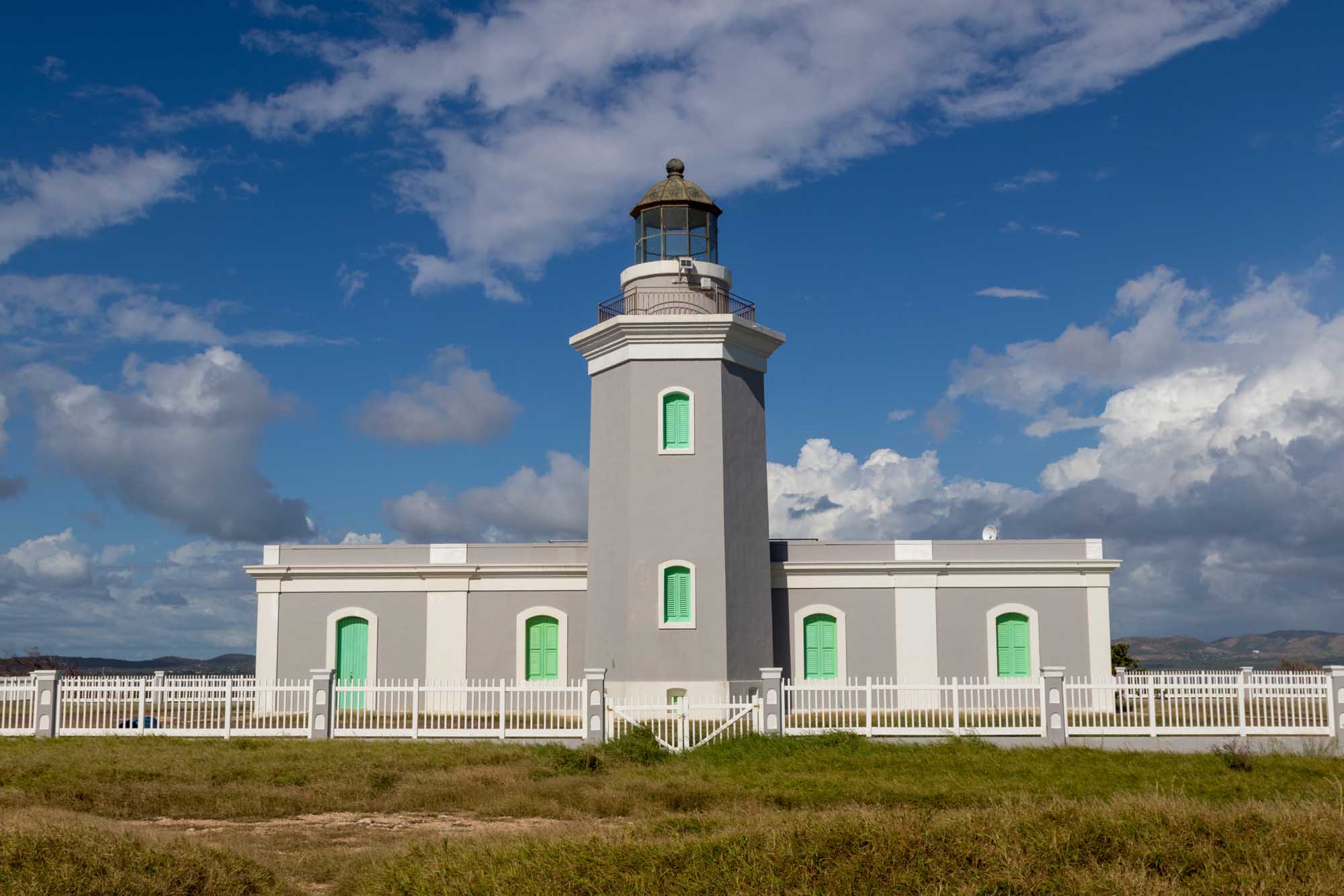 Cabo Rojo Lighthouse in Puerto Rico The iconic Cabo Rojo Lighthouse (Faro Los Morrillos de Cabo Rojo) stands against a brilliant blue