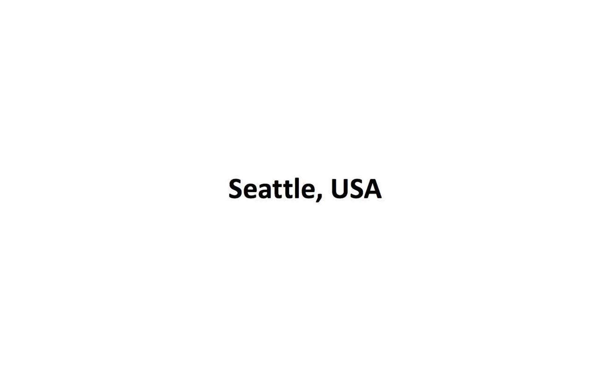 Seattle, USA Text Overlay A minimalist image with the text 'Seattle, USA' displayed prominently in the center against a plain