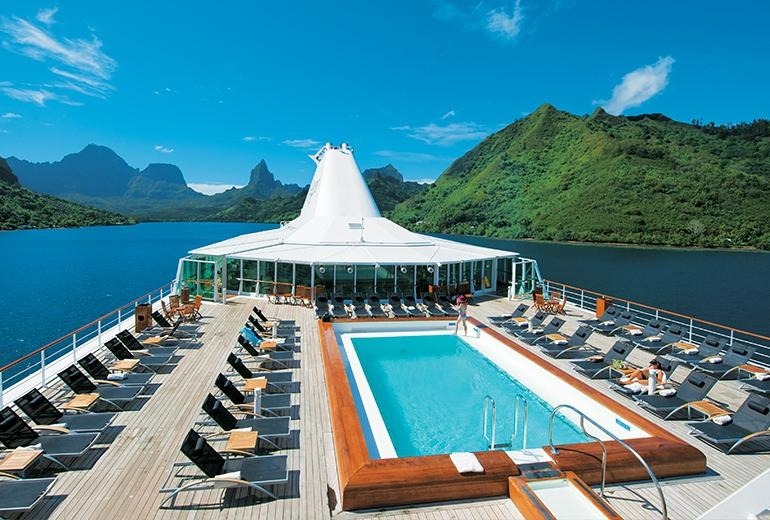 pg-pool-1858_772x520 Paul Gauguin cruise ship anchored in turquoise Polynesian lagoon